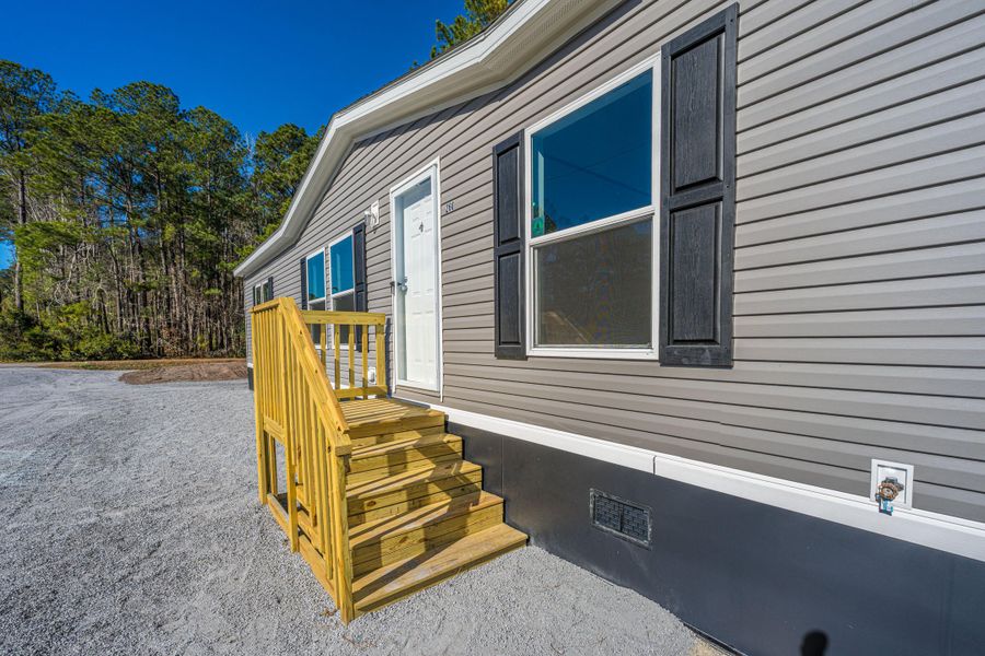 Exterior details and patio area of a home in , Summerville (Image 21).