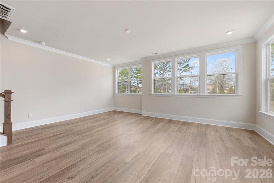 Light-filled living room with end unit windows