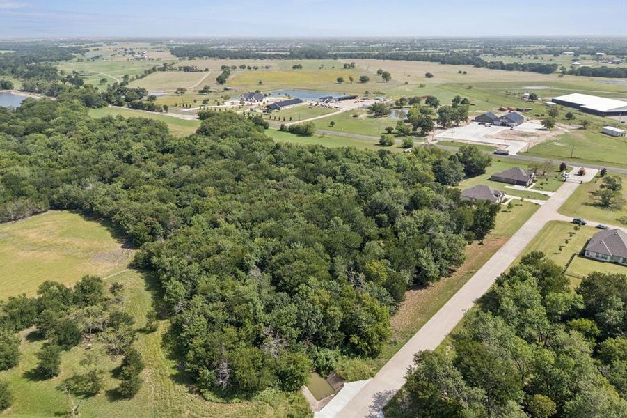 Aerial view of property and surrounding area.