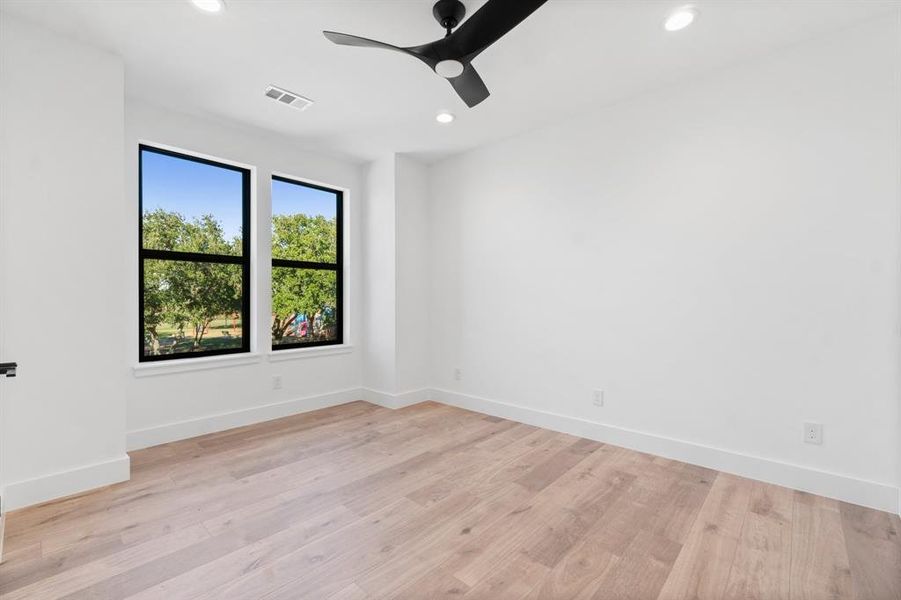 The house has 5 bedrooms, 3 of those are upstairs.  Here it is a view of the first secondary bedroom with no carpet.