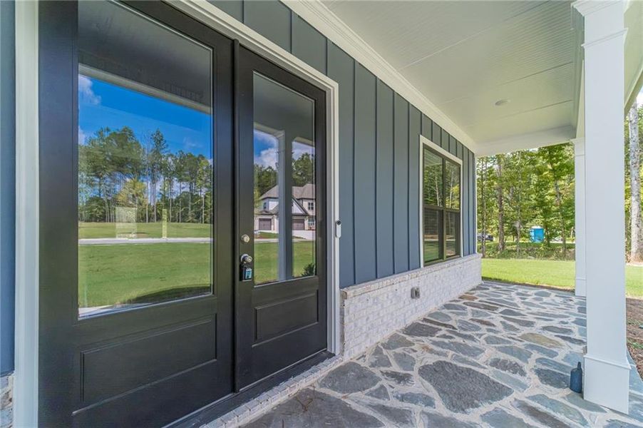 Exterior details and patio area of a home in , Loganville (Image 32).