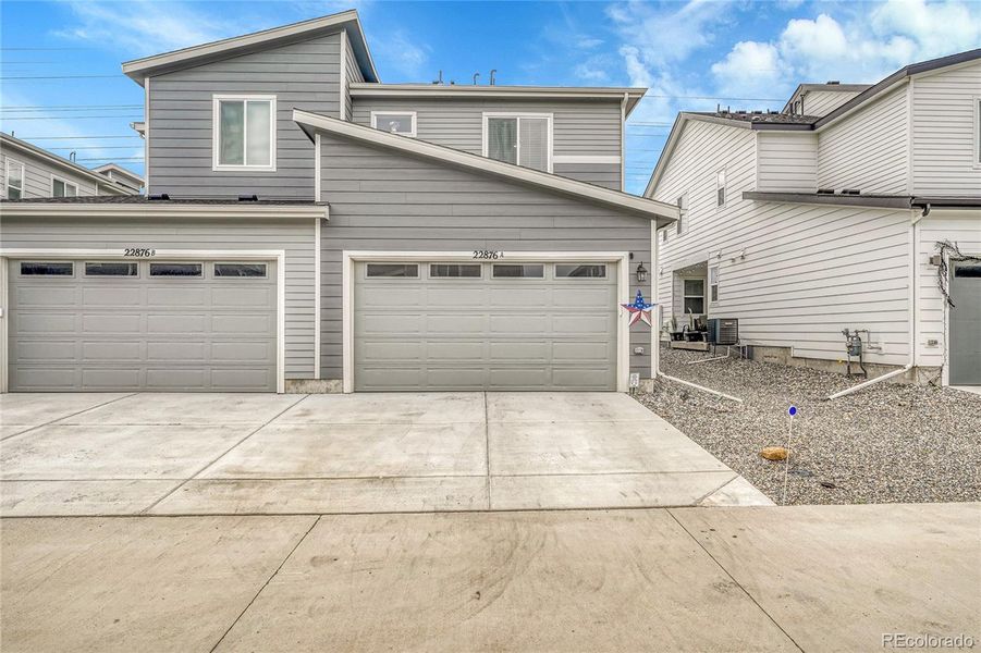 Exterior details and patio area of a home in Urban Collection at Copperleaf, Aurora (Image 2).