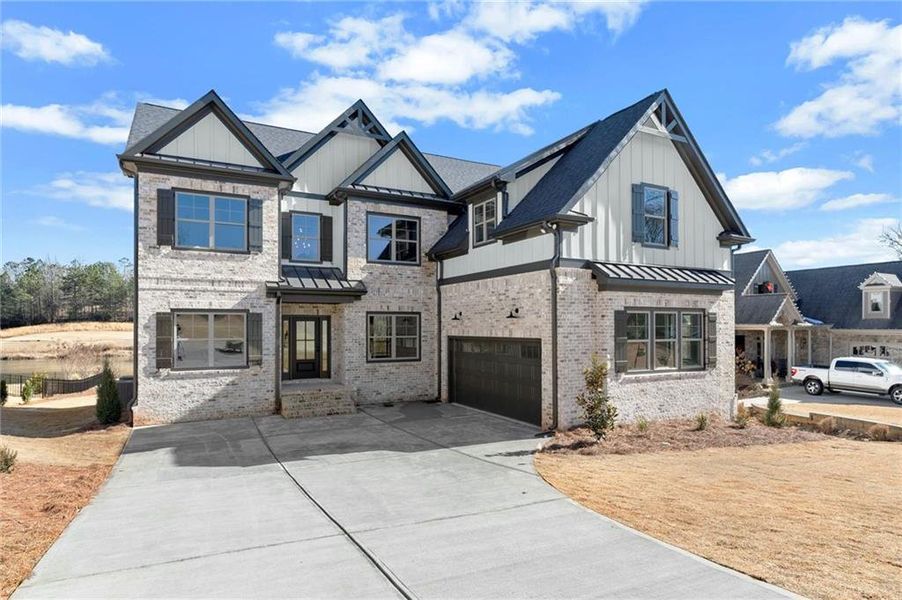 Front exterior of a new home in , Jefferson, GA, highlighting curb appeal (Image 28).