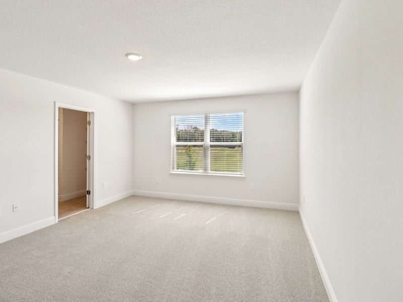 Spacious, unfurnished interior of a new home in The Reserve at Hammock Oaks - Classic Series, Lady Lake (Image 12). Spacious, unfurnished interior of a new home in The Reserve at Hammock Oaks - Classic Series, Lady Lake (Image 12).