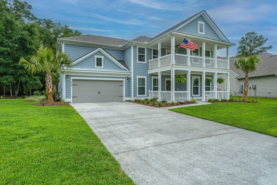 Front exterior of a new home in Sea Island Preserve, Johns Island, SC, highlighting curb appeal (Image 24).