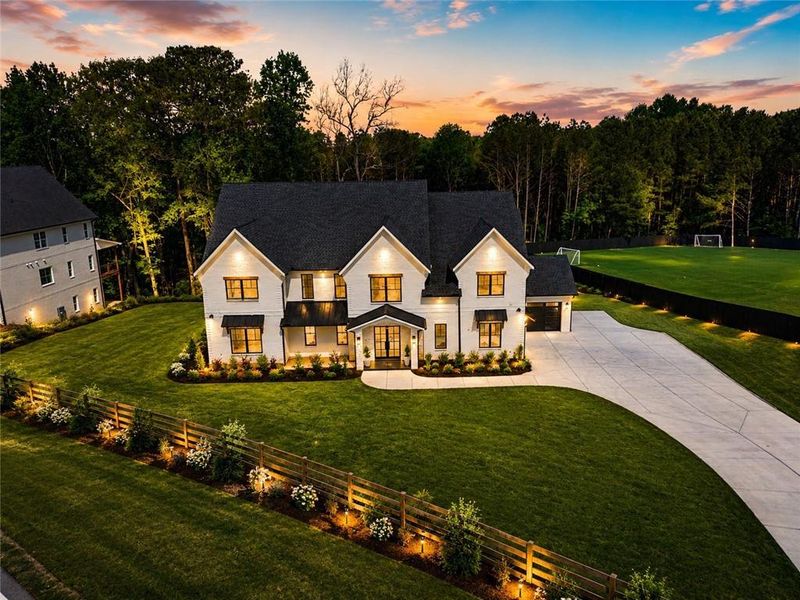 Front exterior of a new home in , Bethlehem, GA, highlighting curb appeal (Image 26).