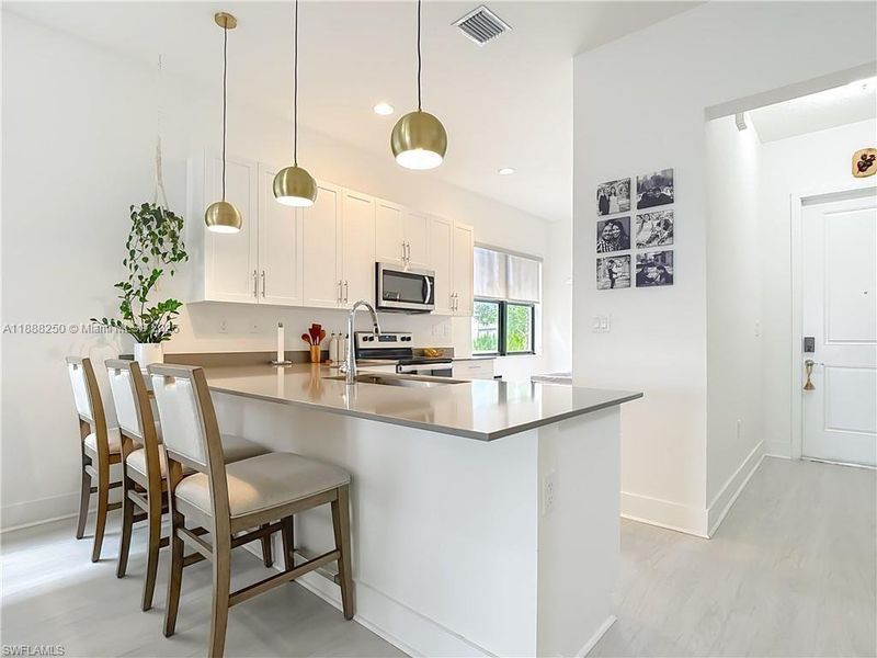 Furnished interior view inside a new home in , Ave Maria (Image 9).