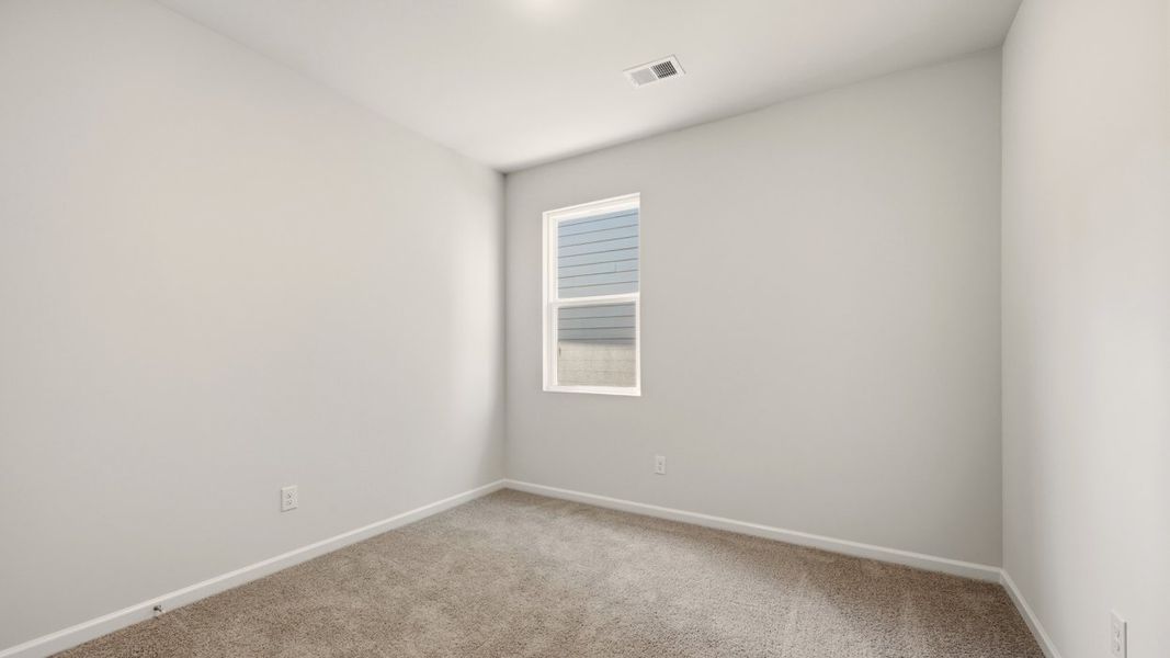 Spacious, unfurnished interior of a new home in The Reserve at Calcutta, Stockbridge (Image 15).
