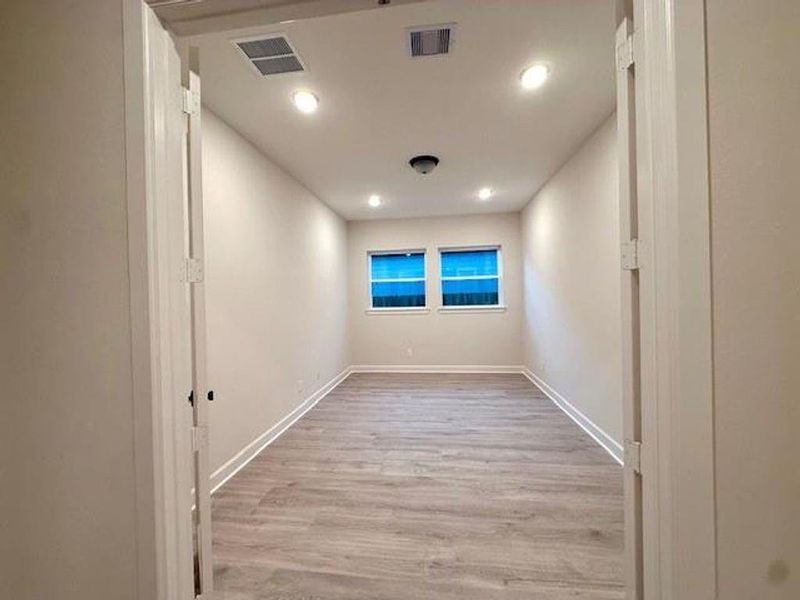 Glass french doors provide privacy at the Study Glass french doors provide privacy at the Study