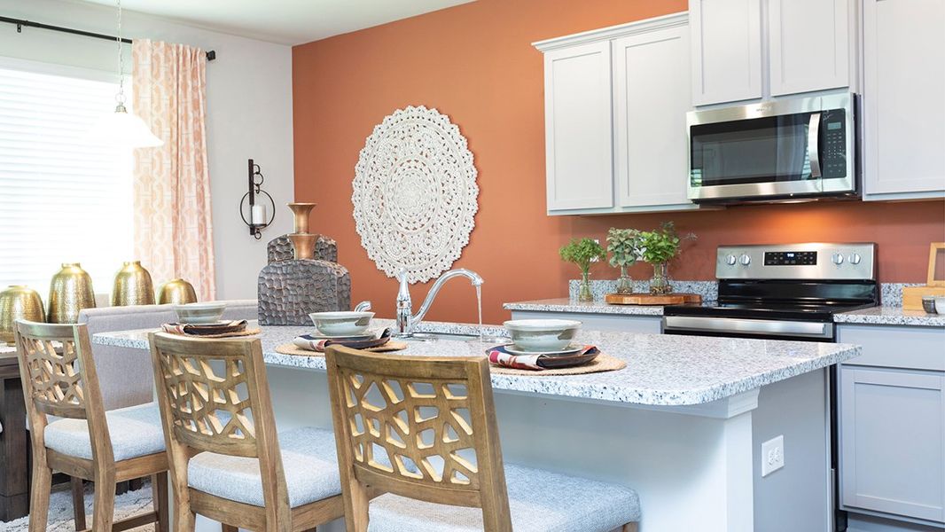 Representative furnished interior of a home built from the Cabral by D.R. Horton in Twin Lakes, Hoschton (Image 7).