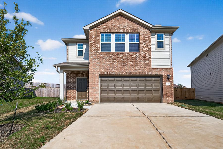 Front exterior of a new home in Chapel Run, Montgomery, TX, highlighting curb appeal (Image 24). Front exterior of a new home in Chapel Run, Montgomery, TX, highlighting curb appeal (Image 24).