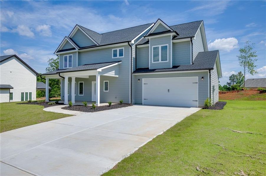 Front exterior of a new home in , Toccoa, GA, highlighting curb appeal (Image 22). Front exterior of a new home in , Toccoa, GA, highlighting curb appeal (Image 22).