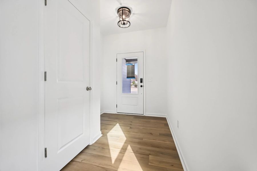 Foyer featuring the AW Collection® Harmony - A refined welcome with soft light and style. Foyer featuring the AW Collection® Harmony - A refined welcome with soft light and style.