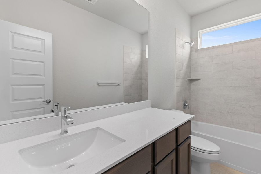 Furnished interior view inside a new home in Barton Creek Ranch, Conroe (Image 9). Furnished interior view inside a new home in Barton Creek Ranch, Conroe (Image 9).