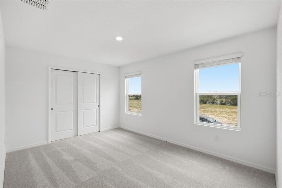 Spacious, unfurnished interior of a new home in Waterstone, Groveland (Image 24).