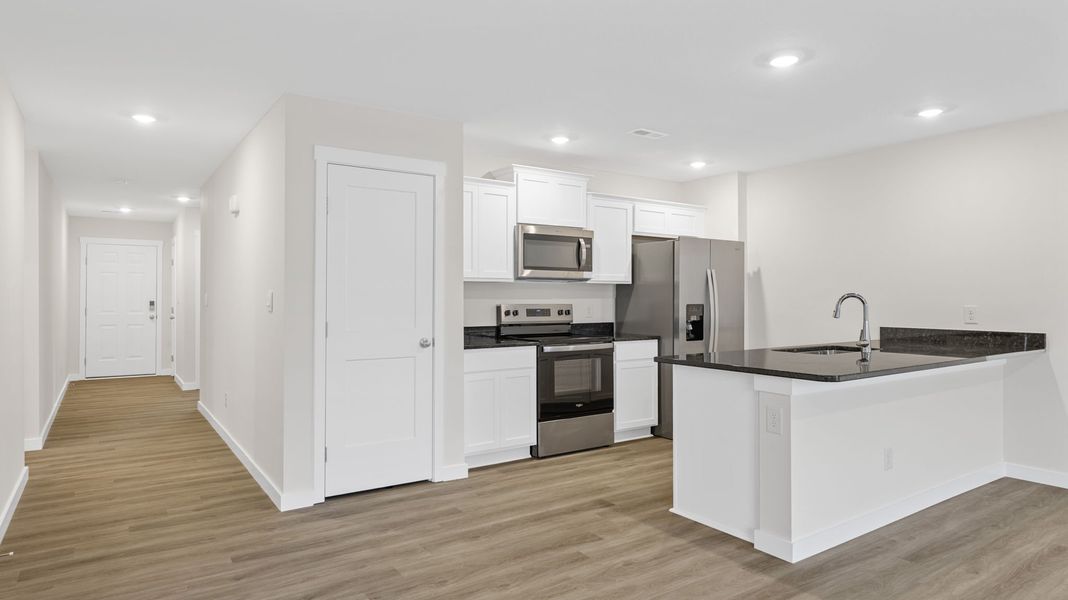 Representative furnished interior of a home built from the Freeport by D.R. Horton in Owensby Farms, Dayton (Image 5).