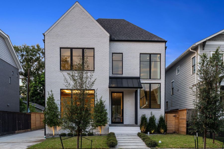 Front exterior of a new home in , Houston, TX, highlighting curb appeal (Image 32).