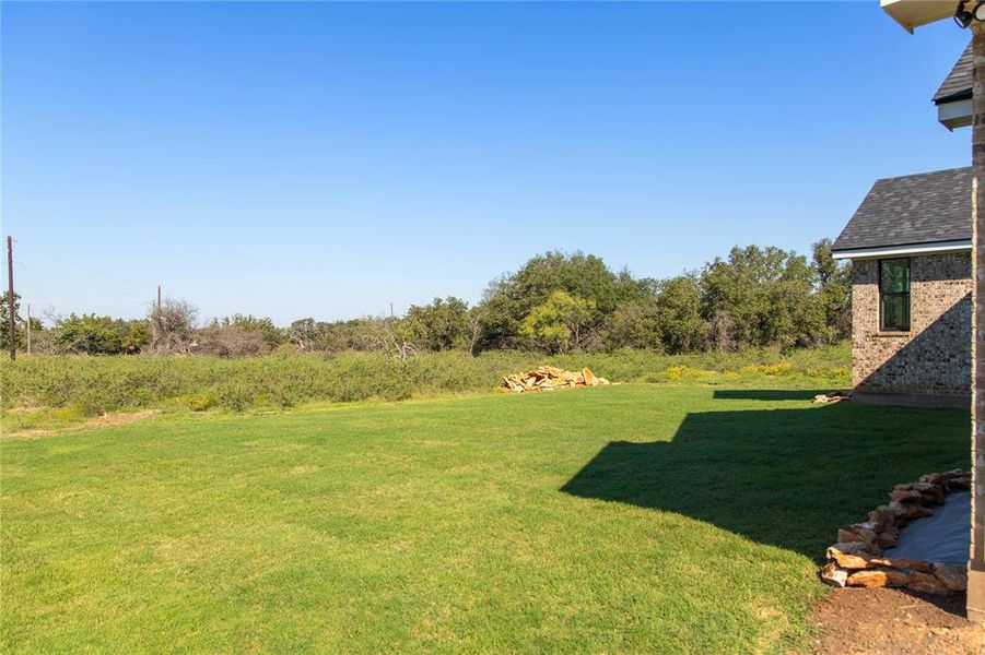 Exterior details and patio area of a home in , Brownwood (Image 25).