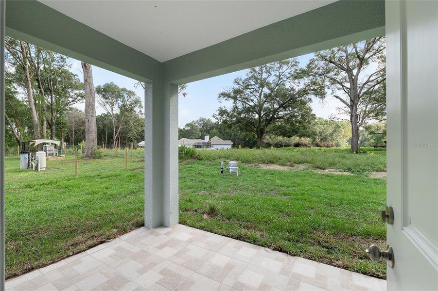Exterior details and patio area of a home in , Summerfield (Image 30). Exterior details and patio area of a home in , Summerfield (Image 30).