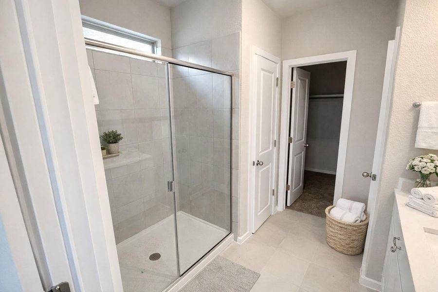 Primary Bath retreat with dual vanities & walk-in shower