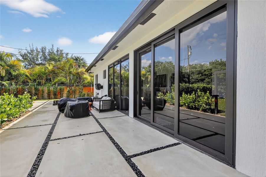 Exterior details and patio area of a home in , Miami (Image 3).