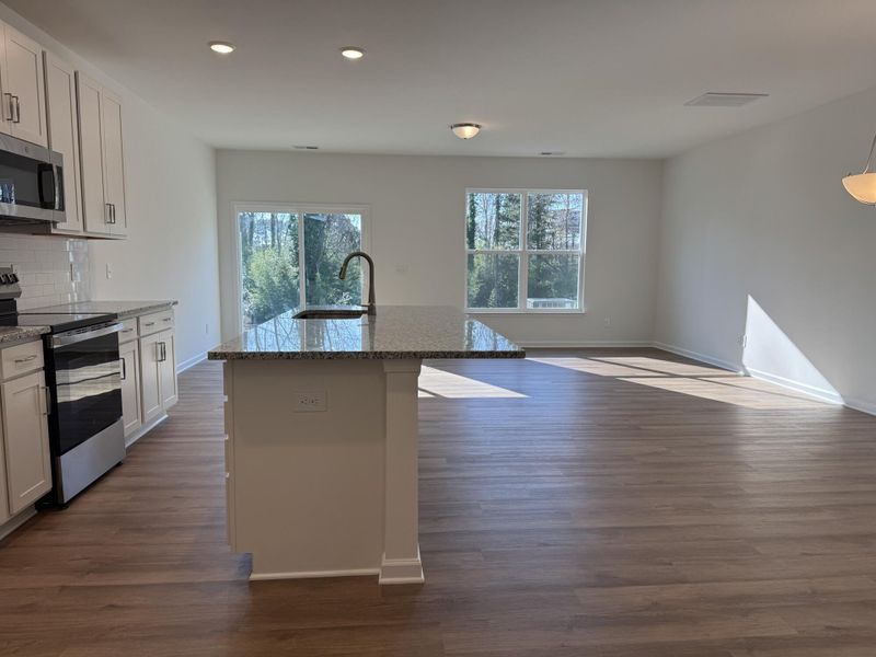 Spacious, unfurnished interior of a new home in East Main Townes, Spartanburg (Image 9).