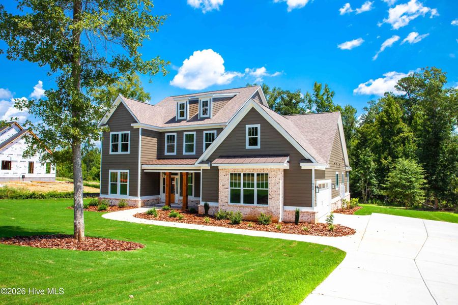 Front exterior of a new home in Marshall Mills, Grovetown, GA, highlighting curb appeal (Image 2). Front exterior of a new home in Marshall Mills, Grovetown, GA, highlighting curb appeal (Image 2).