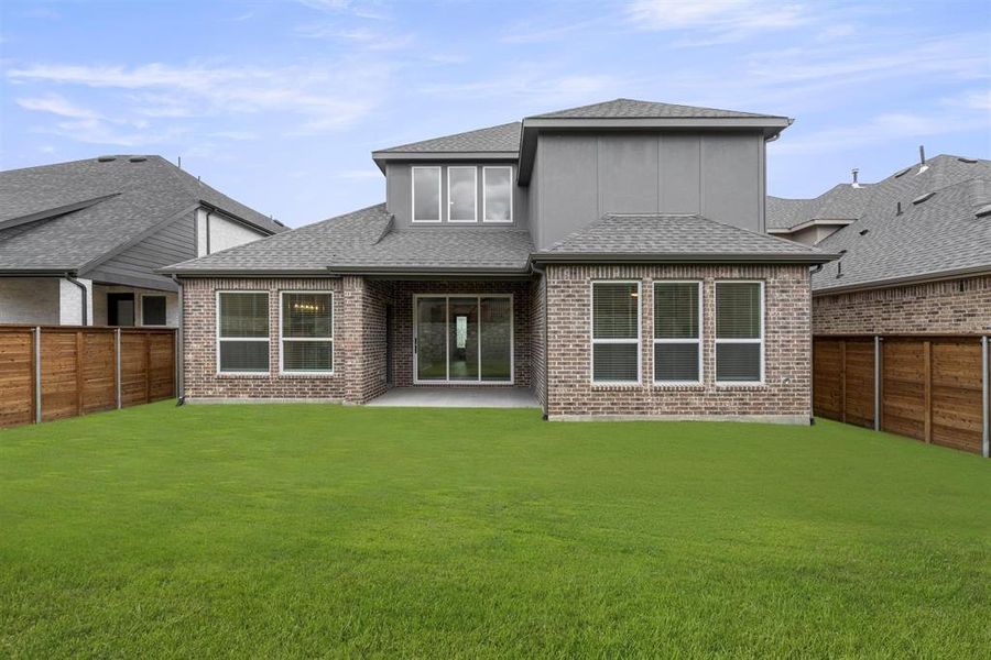 Front exterior of a new home in Solterra, Mesquite, TX, highlighting curb appeal (Image 16).