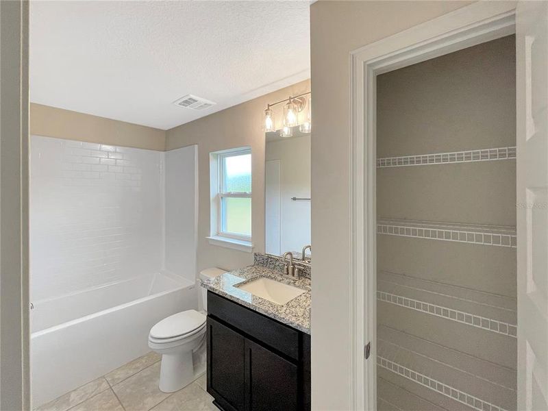 Furnished interior view inside a new home in Harmony Central, St. Cloud (Image 7).