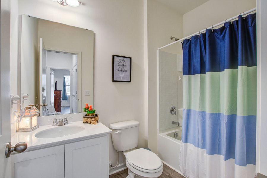 Furnished interior view inside a new home in Pender Woods at Cane Bay, Summerville (Image 7).