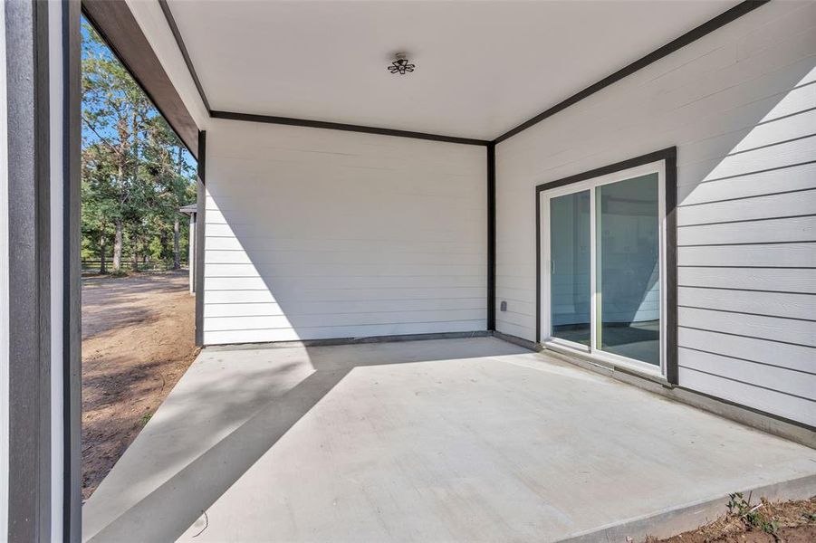 Another view of covered porch for better idea of how it comes off of living room.