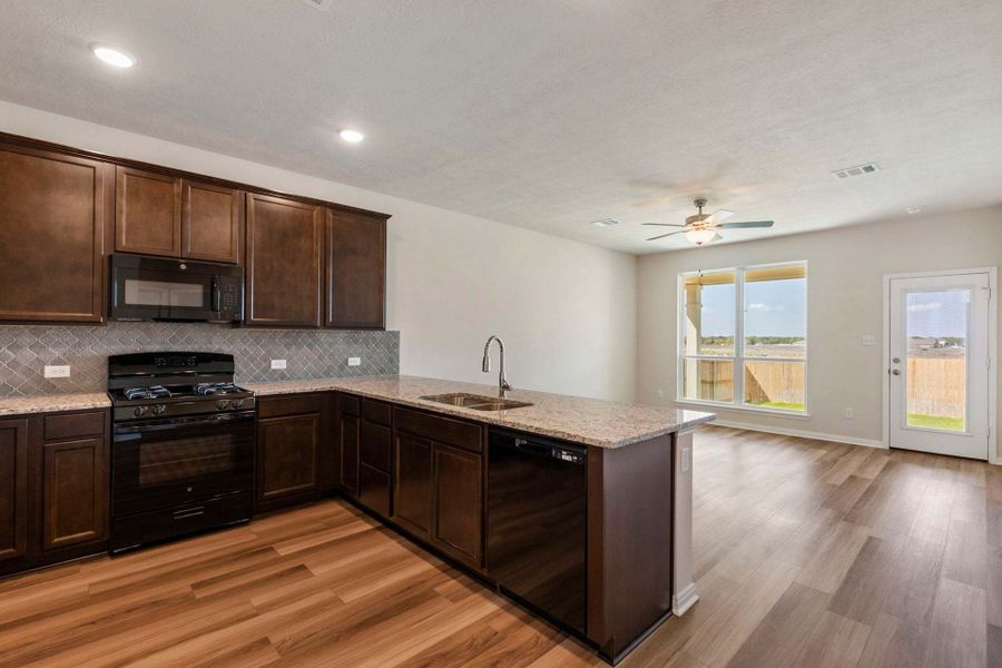 2D floor plan layout for the The 1443 by Stylecraft Builders in Sterling Ridge, Huntsville, TX (Image 7).