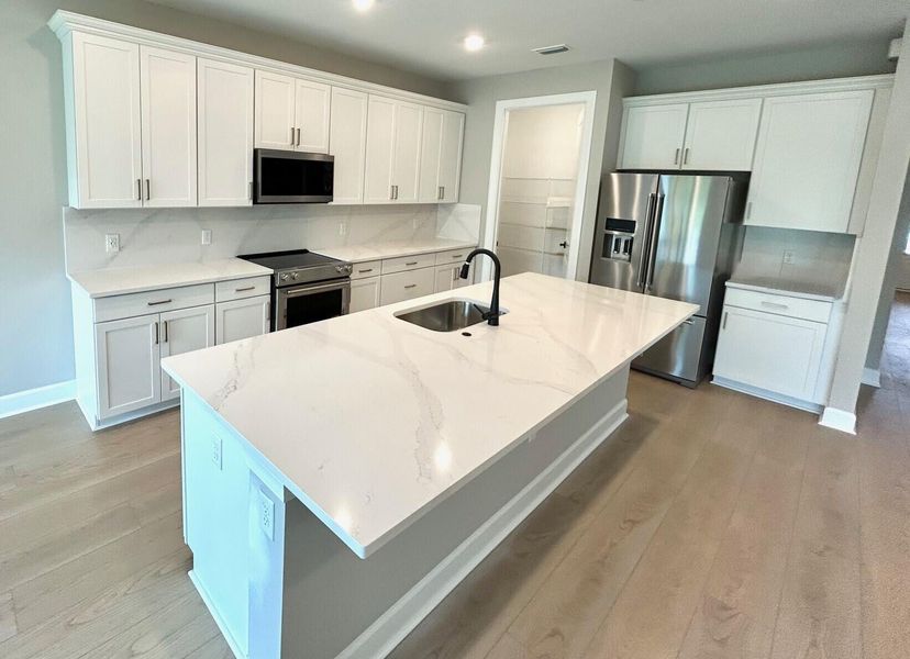 Furnished interior view inside a new home in Hendrix Reserve, Lake Worth (Image 13). Furnished interior view inside a new home in Hendrix Reserve, Lake Worth (Image 13).