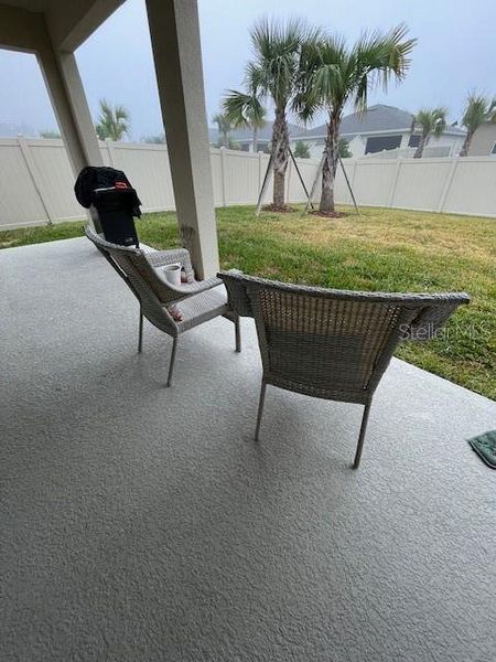 Exterior details and patio area of a home in Archers Mill, Ormond Beach (Image 3).