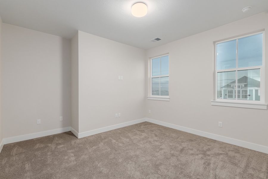 Representative unfurnished interior of a home built from the Luxe by Scott Felder Homes in Westerly, Erie (Image 51).