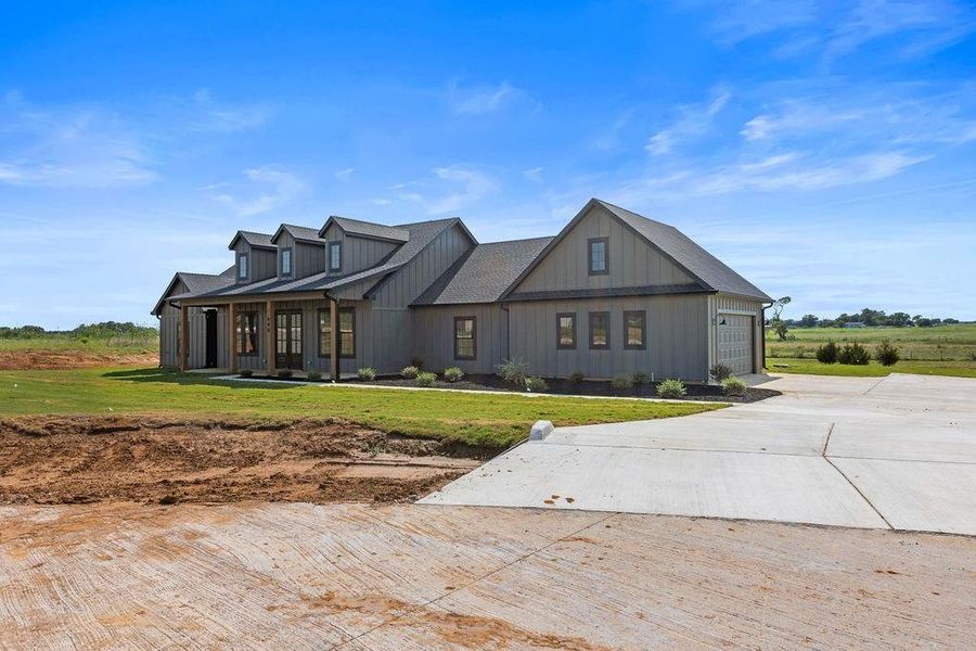 Front exterior of a new home in , Whitesboro, TX, highlighting curb appeal (Image 21). Front exterior of a new home in , Whitesboro, TX, highlighting curb appeal (Image 21).