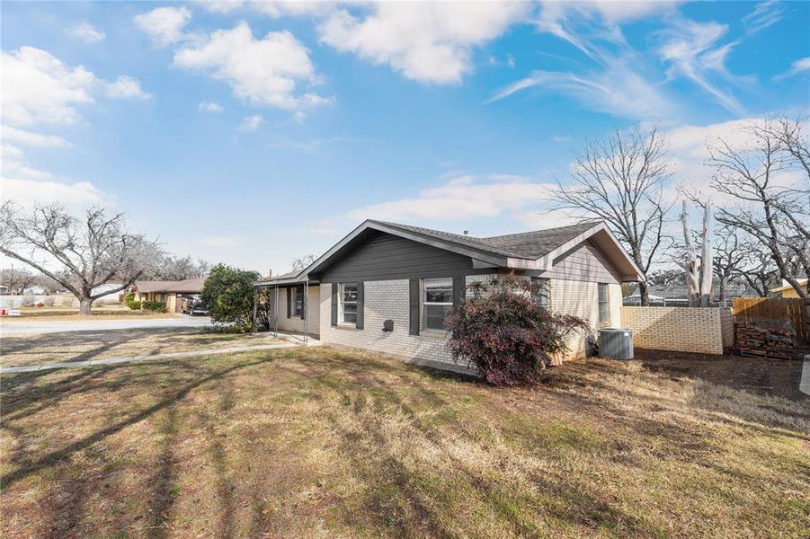 Front exterior of a new home in , Brownwood, TX, highlighting curb appeal (Image 15).