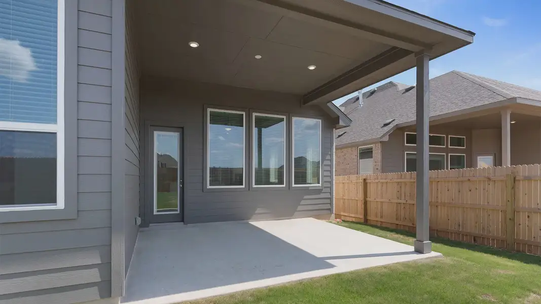 Exterior details and patio area of a home in Santa Rita Ranch, Liberty Hill (Image 4).