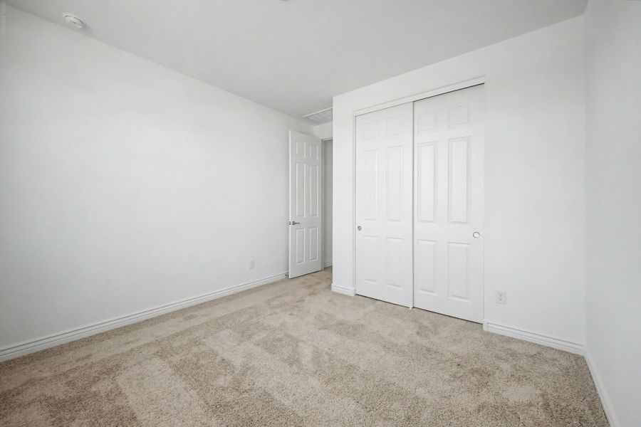 Spacious, unfurnished interior of a new home in Miravida, Surprise (Image 18).