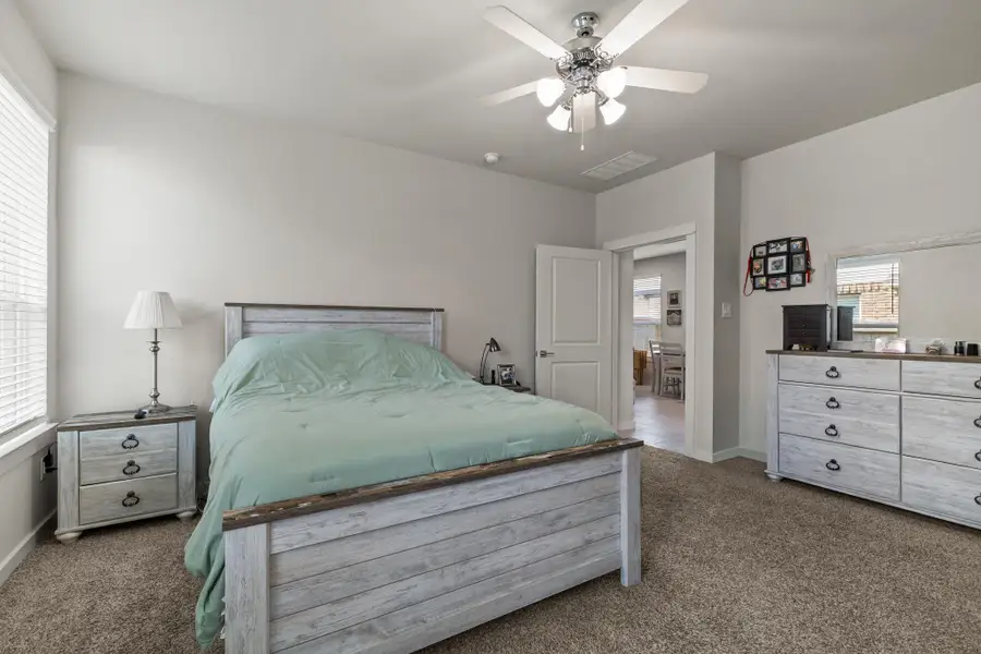 Furnished interior view inside a new home in , Iowa Colony (Image 13).