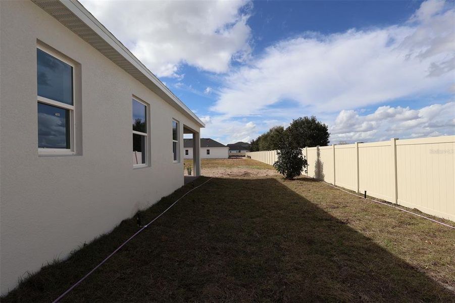 Exterior details and patio area of a home in Bay Lake Farms, St. Cloud (Image 3).