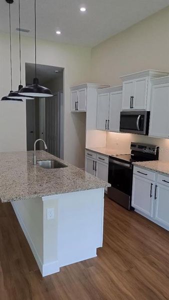 Furnished interior view inside a new home in , Orange City (Image 10).