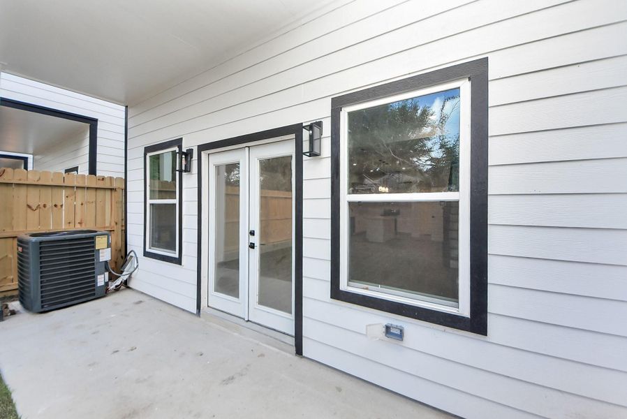 Exterior details and patio area of a home in , Houston (Image 4). Exterior details and patio area of a home in , Houston (Image 4).