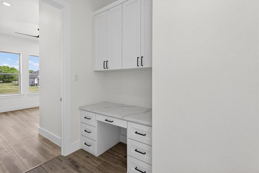 Built in desk near secondary bedrooms