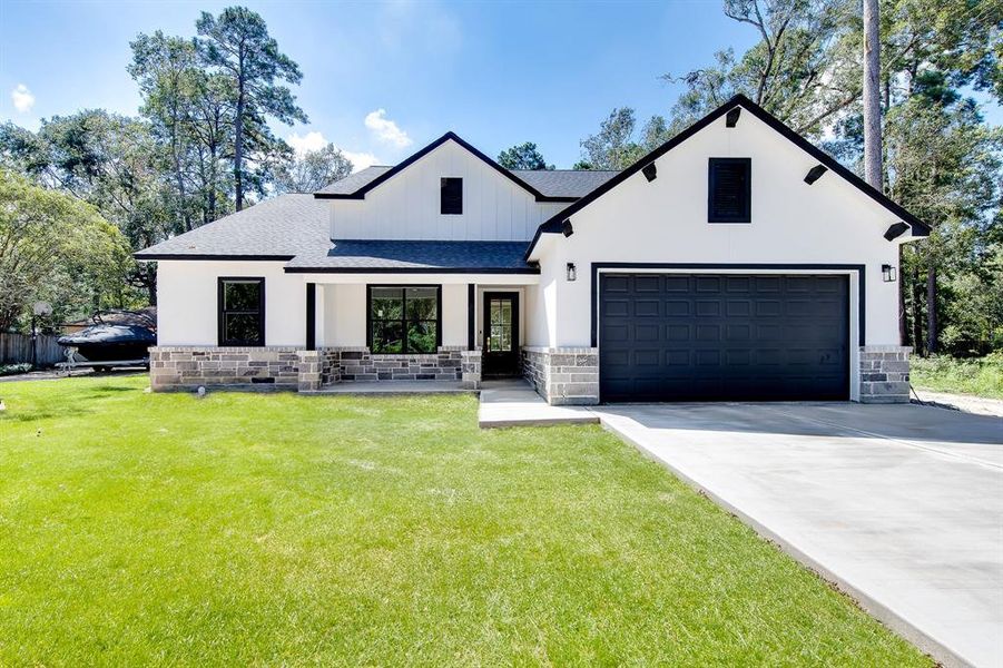 Step up to this brand-new home and fall in love with its blend of stucco, stone, brick, and cement board—each element coming together to create a striking and elegant exterior. This isn’t just a house; it’s a home that welcomes you with charm and sophistication.