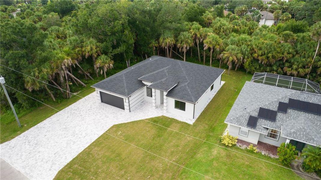 Front exterior of a new home in , North Port, FL, highlighting curb appeal (Image 28).