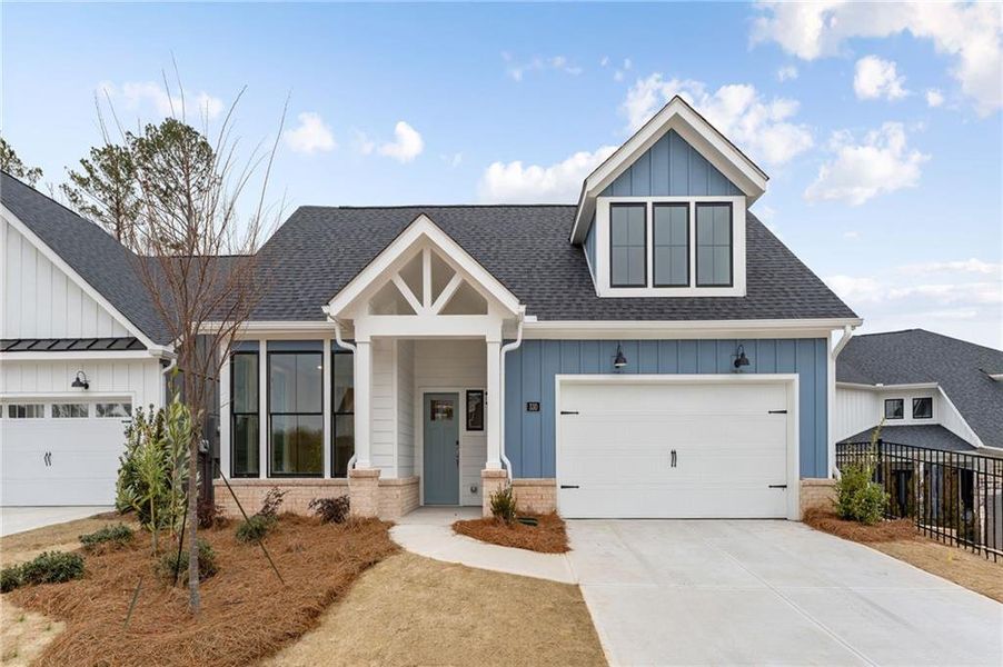 Front exterior of a new home in The Courtyards at Redbud Lane, Holly Springs, GA, highlighting curb appeal (Image 2).