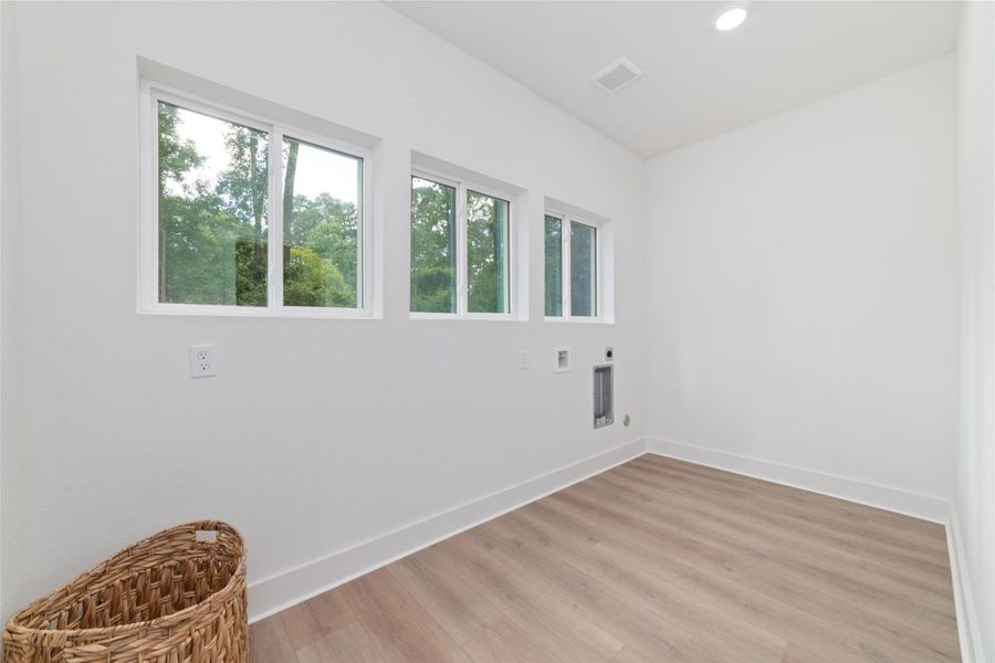 Laundry room with room for additional fridge Laundry room with room for additional fridge