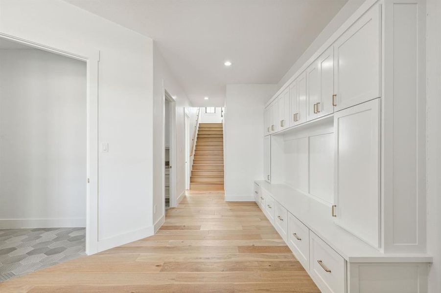 Mudroom with second staircase