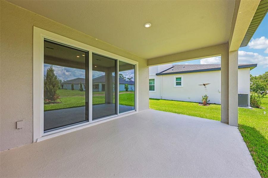 Exterior details and patio area of a home in Ridgehaven - Reserve Series, Ormond Beach (Image 22). Exterior details and patio area of a home in Ridgehaven - Reserve Series, Ormond Beach (Image 22).